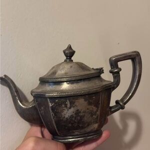 Antique Silver Teapot with Ornate Design
